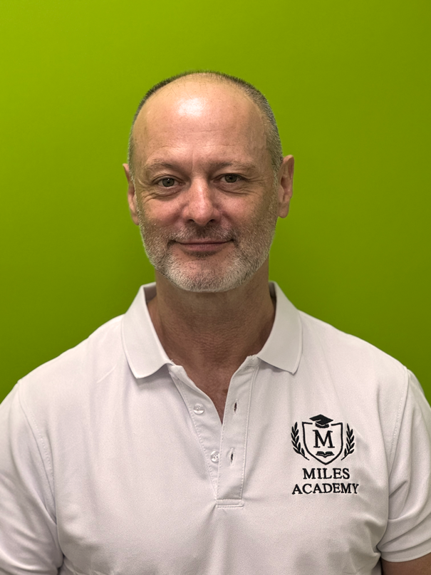 A portrait of Mr. Andrew, a teacher of Miles Academy