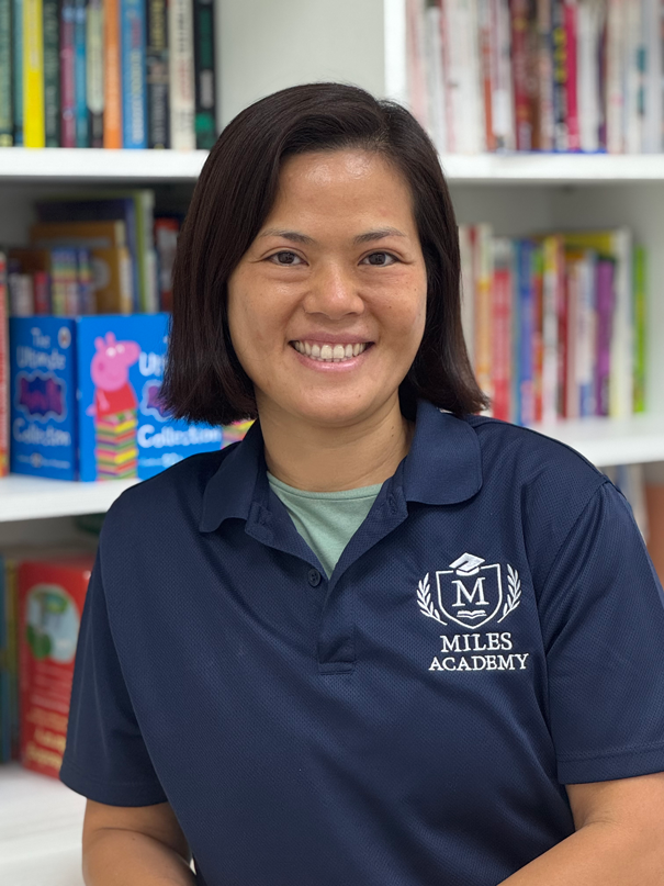 A portrait of Ms. Maggie, a teacher of Miles Academy