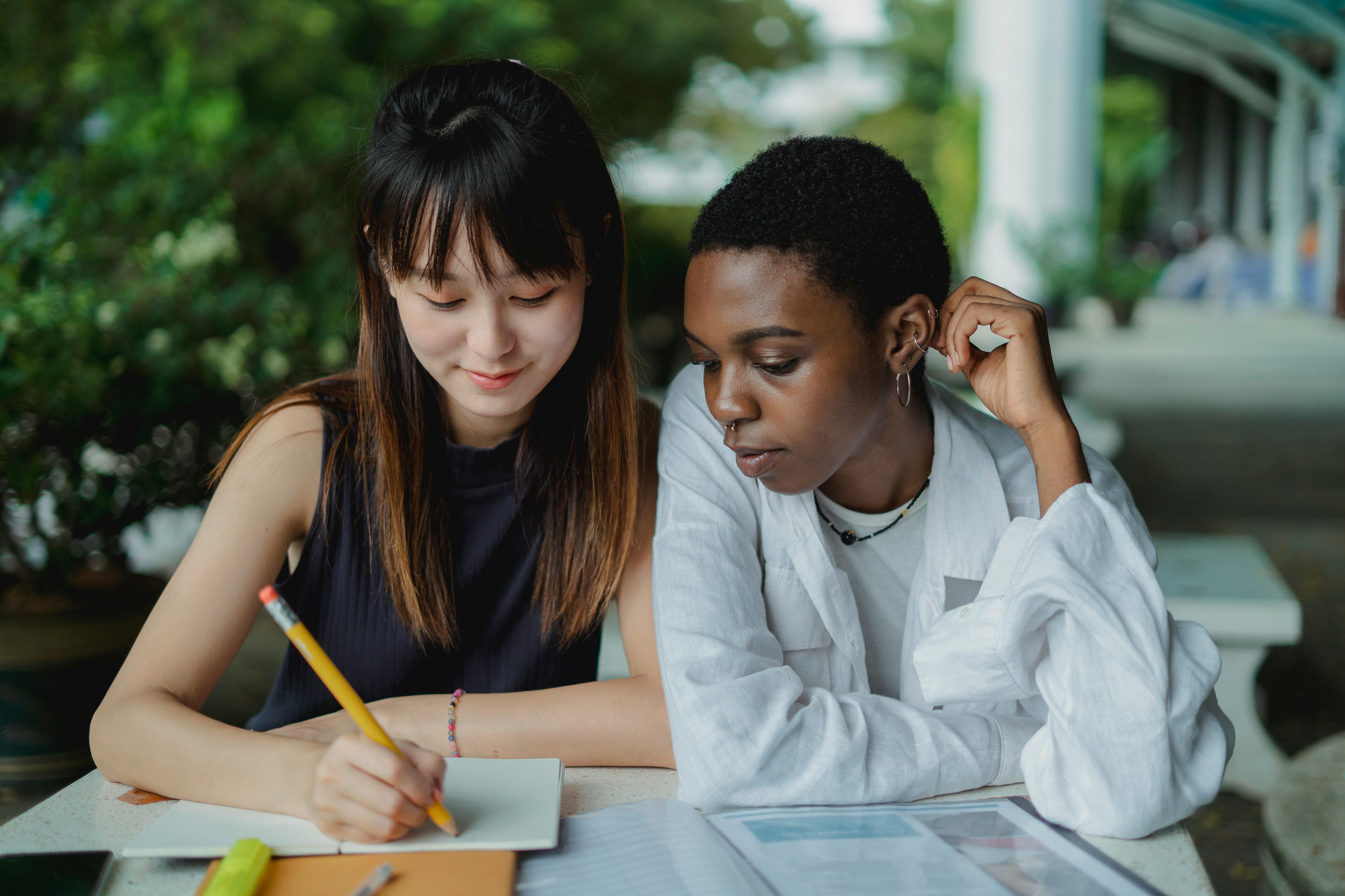Two college students studying on campus